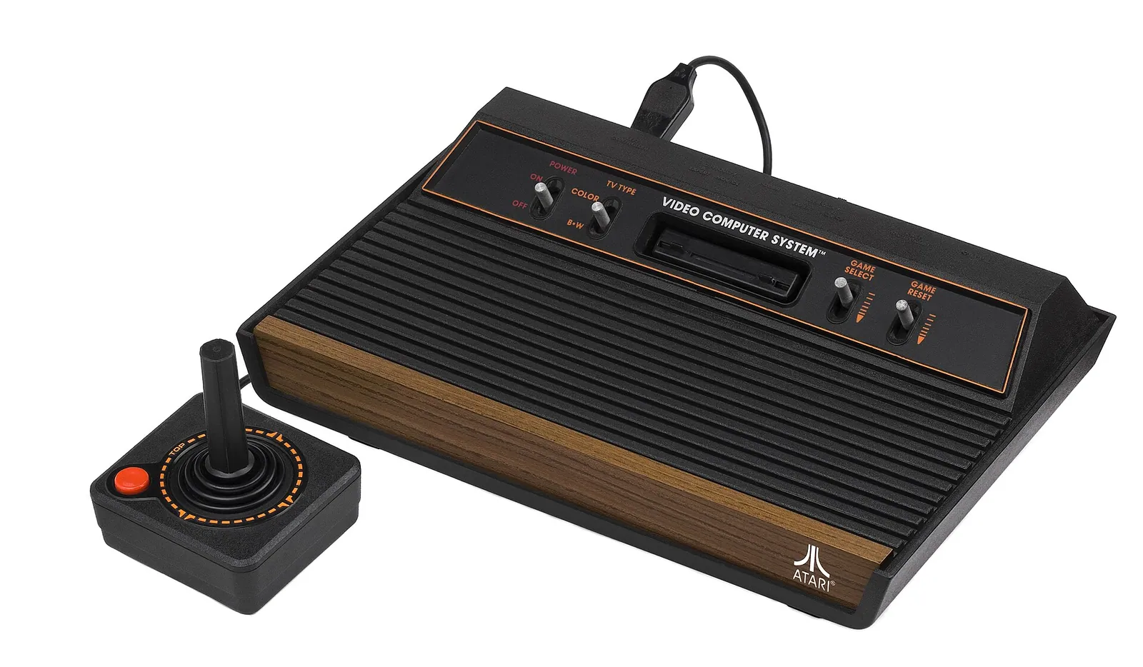 Console Atari 2600 à façade imitation bois, avec son joystick